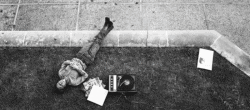 Man lying down and listening to music