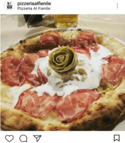 Perfect artichoke seems a flower on a pizza
